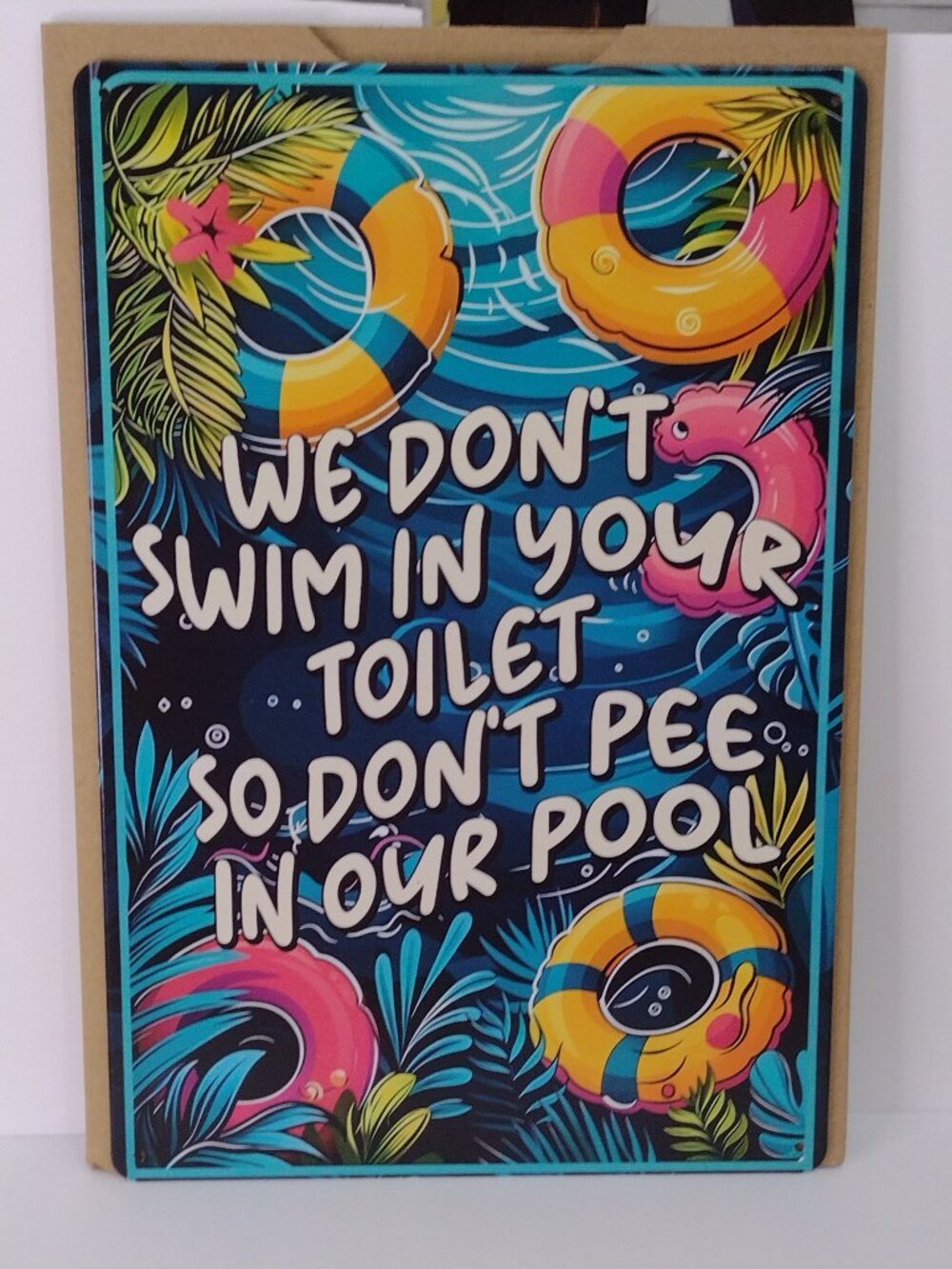 Metal Sign We Don't Swim in Your Toilet...Don't Pee in Our Pool Life Preserver